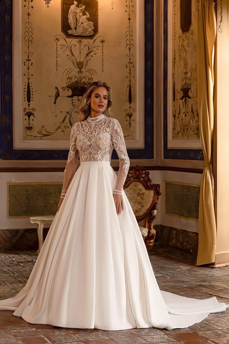 A bride in a high-neck lace-bodice gown with a satin skirt